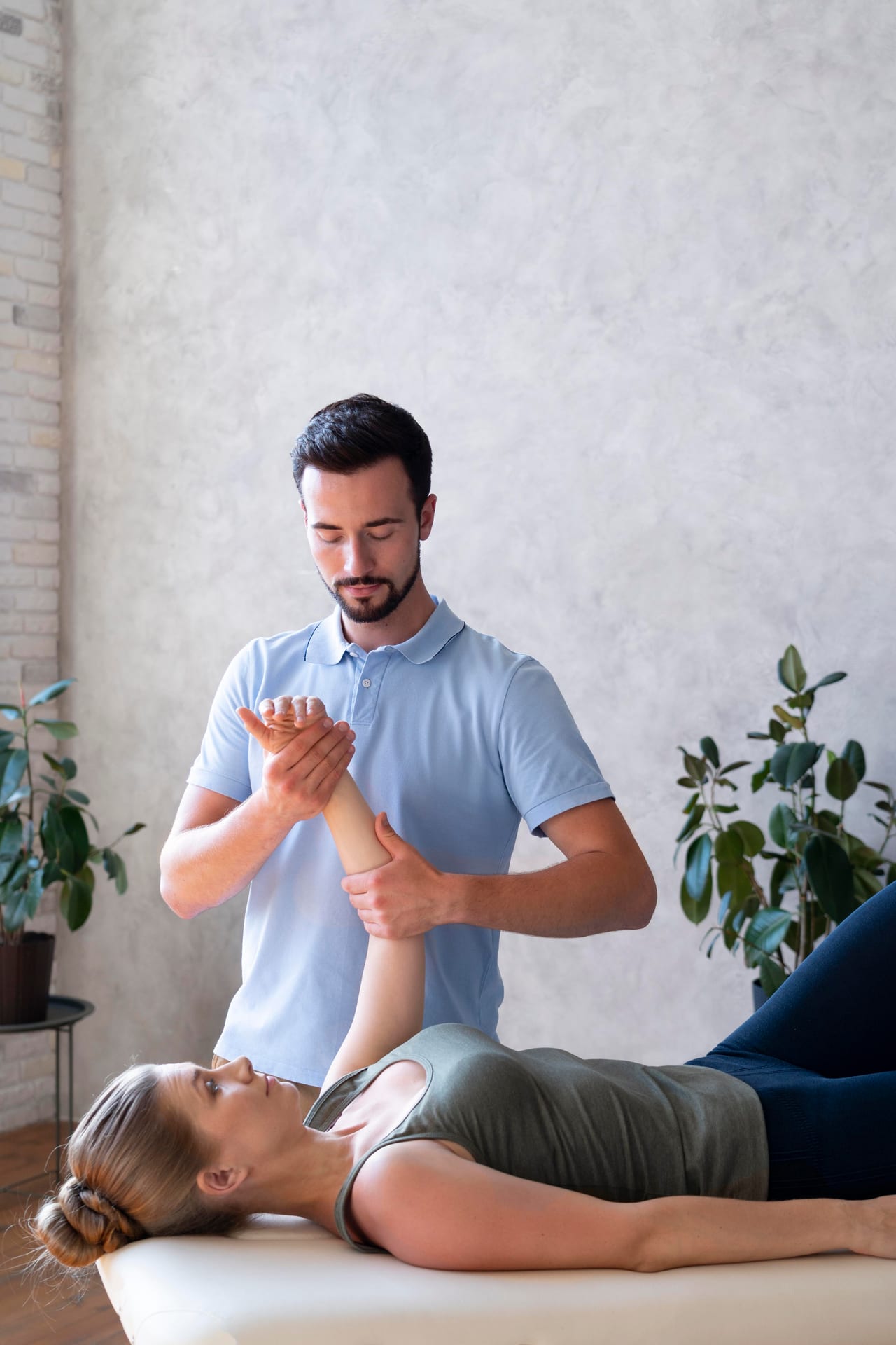 Therapist performing hands-on treatment